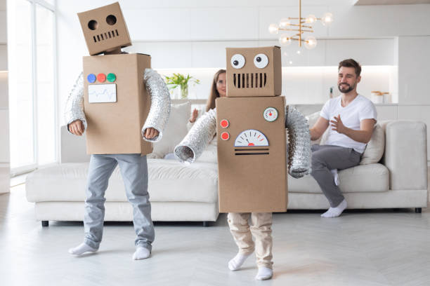 istock Family playing robots at home 1439505890