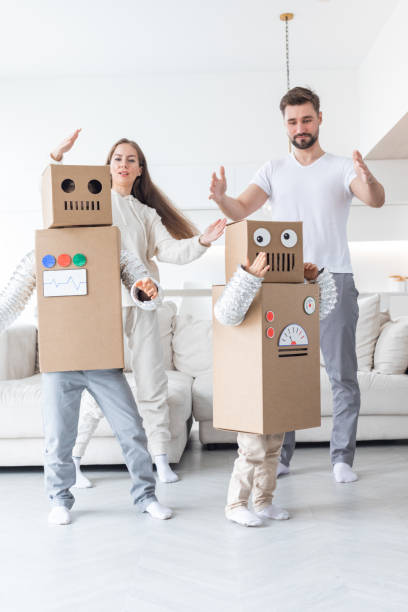 istock Family playing robots at home 1439505960