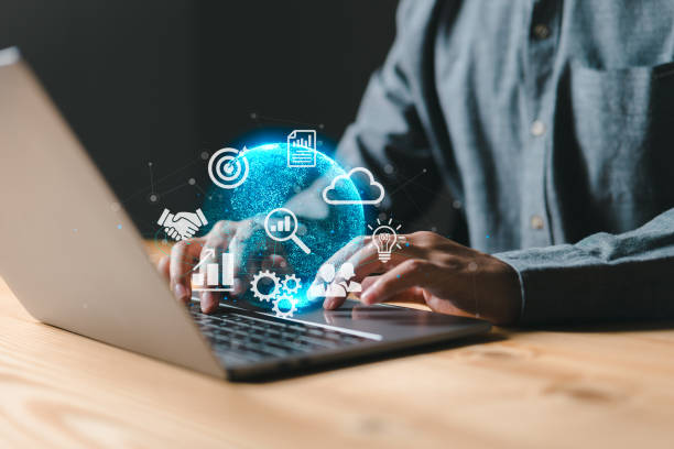 istock Man interacting with a virtual global internet connection metaverse for business, digital marketing, financial services, and banking, as well as big data 1439509526