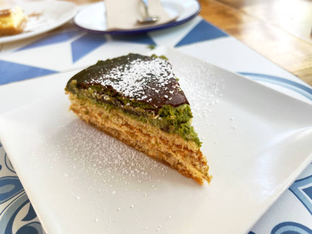 istock piece of pistachio cake plated 1439510589