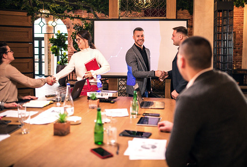 Group of business persons in business meeting in the office