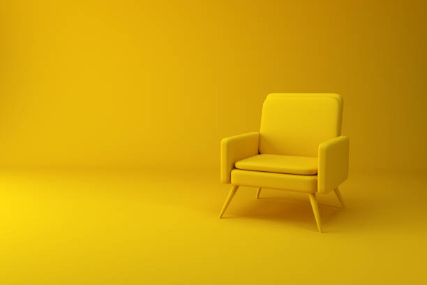 istock Modern yellow armchair on yellow background. 1439513553