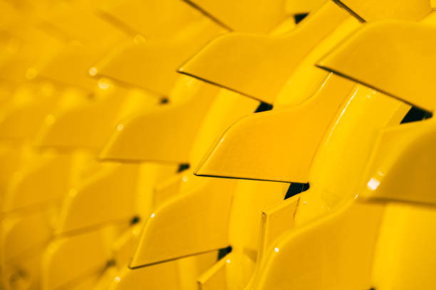 Close up of yellow tractor disc harrows, selective focus