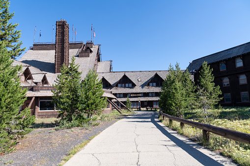 Wyoming, USA - July 19, 2022: Walkway leading to the famous Old Faithful Inn at Yellowstone National Park