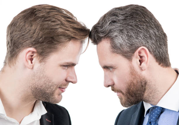istock business competition. arguing businesspeople. dissatisfied men discuss failure. 1439517103