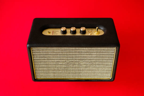 istock Vintage style bluetooth speaker on red background 1439517356