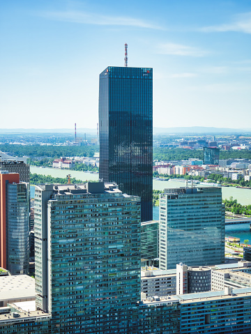 Vienna, Austria - June 2022: PwC (PricewaterhouseCoopers) offices located in DC Tower skyscraper in Vienna