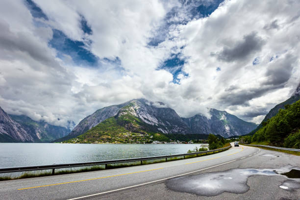 Scenic road in the mountains of Western Norway. Summer, July. Scandinavia. Beginning of the Hardangerfjord. Magical journey in the cold northern country.