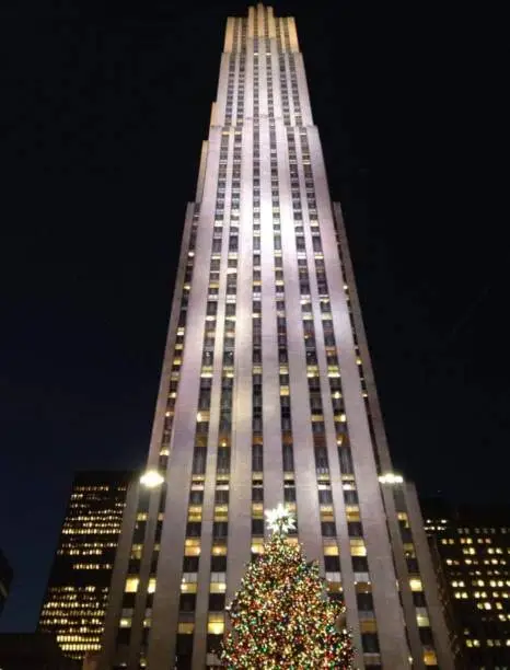Photo of 30 Rockefeller Plaza (officially the Comcast Building; formerly RCA Building and GE Building) is a skyscraper that forms the centerpiece of Rockefeller Center in the Midtown Manhattan