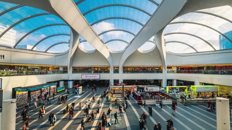 Time lapse of Crowded Commuter people in Birmingham New Street Station in downtown district of Birmingham City