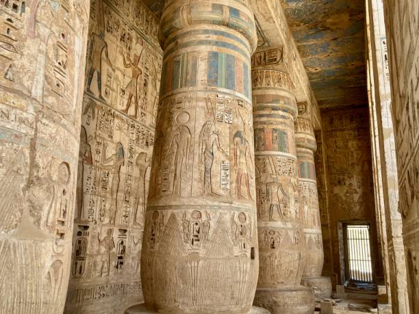 Carvings on the walls of Medinet Habu Temple in Luxor, Egypt Medinet Habu is the name which has been given to the ancient Mortuary Temple of Ramesses III, located on the West Bank in Luxor. medinet habu stock pictures, royalty-free photos & images