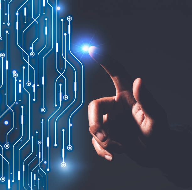 istock Hand finger pointing abstract circuit digital technology. Creating the technology concept. 1439528326