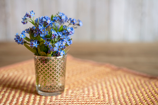 Forget-me-not Bouquet  on wooden table