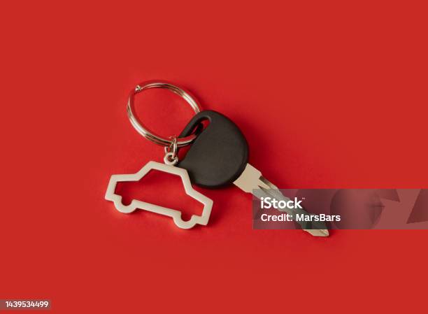 Car Key With Keychain On Red Background Stock Photo - Download Image Now - Car, Close-up, High Angle View