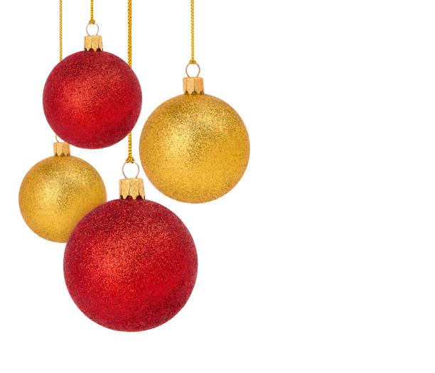istock Four glittering Christmas ornaments isolated on white 1439537603