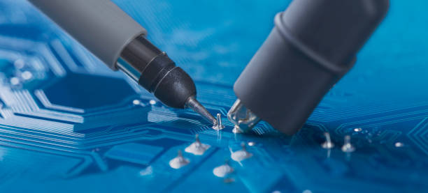 istock Measuring electronic signal using oscilloscope on the PCB. Electronics repair and digital technology. 1439538118