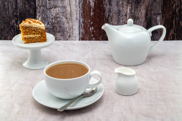 Coffee and cake A slice of cake with a cup of coffee carrot cake day stock pictures, royalty-free photos & images