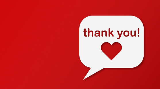 Thank You and Speech Bubbles with Copy Space On Red Cardboard Background