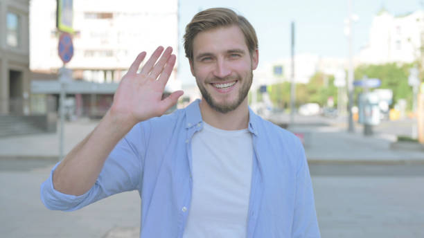 istock Online Video Chat by Talking Man Outdoor 1439546686