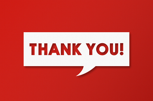 Thank You and Speech Bubbles with Copy Space On Red Cardboard Background