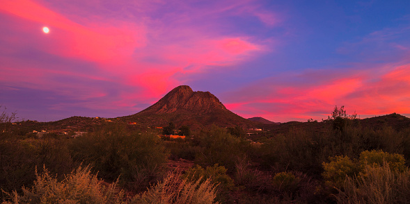 Arizona nightscape with vibrant saturated red twilight colors after sunset in November near Phoenix