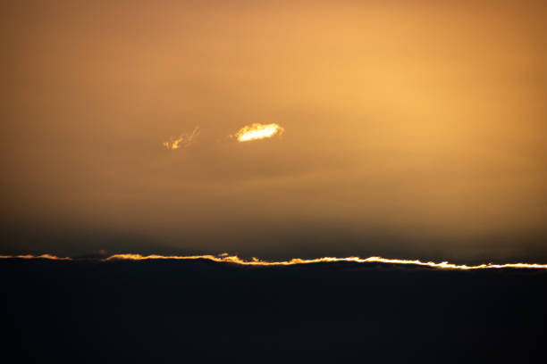 istock cloud above fog bank 1439548107