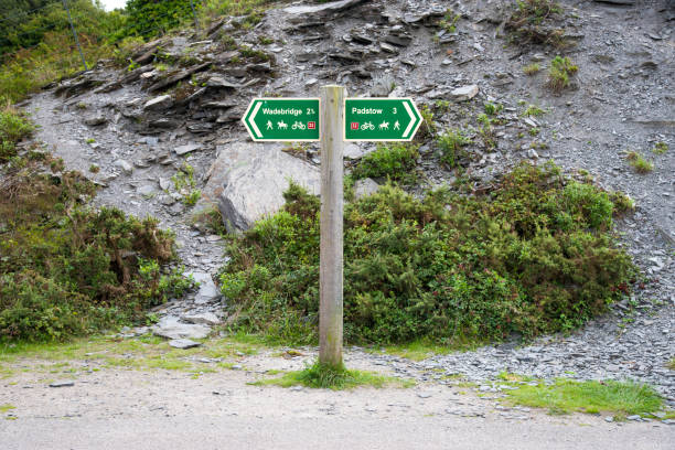 Signpost on the Camel trail at the river Camel between Wadebridge and Padstow in north Cornwall.