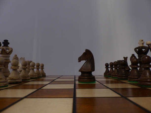 istock Chess - Strategy and tactics game - Set of pieces and checkerboard (King - Queen - Bishop - Knight - Rook - Pawn) 1439555148