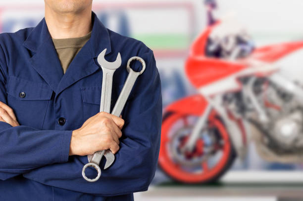 istock Motorcycle mechanic standing at the workshop 1439556862