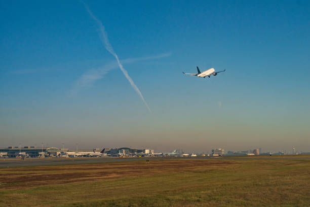 istock Passenger Jet Taking off From Airport 1439558887