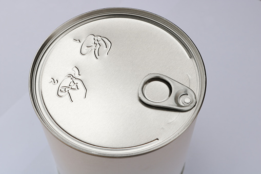 Steel Container. Canned milk powder for babies. Canned food item container.