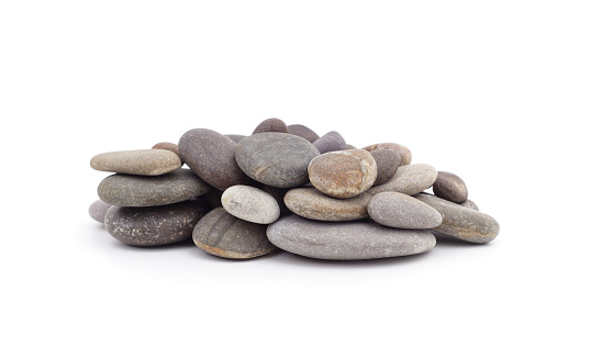 Gray sea stones isolated on a white background.
