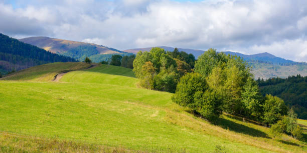 istock mountainous countryside scenery in early autumn 1439567801