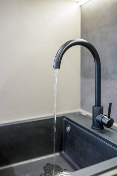 istock Kitchen faucet for water. Water faucet in kitchen. 1439568056