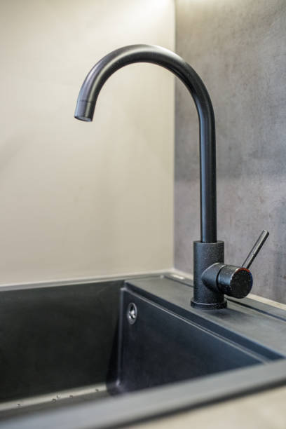 istock Kitchen faucet for water. Water faucet in kitchen. 1439568058