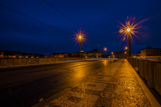 istock Dark capital Prague before cloudy color sunrise over Vltava river 1439569390