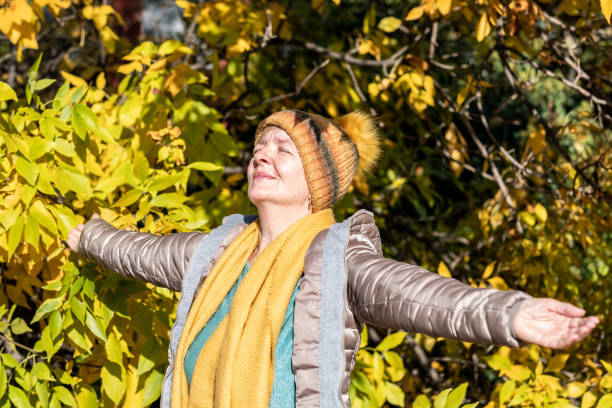 istock Grandma enjoys the park 1439576574