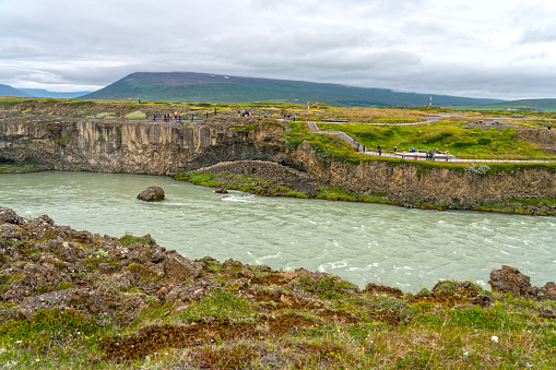 Goðafoss waterfall in Northern Iceland on cloudy day