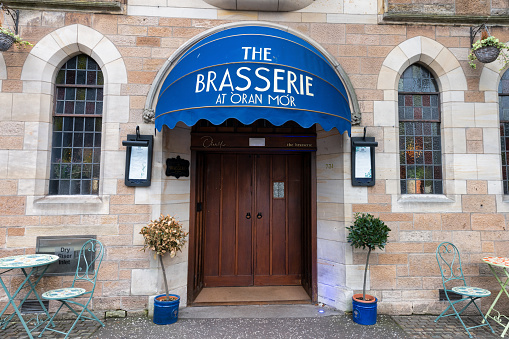 Glasgow, UK- Sept 10, 2022: The entrance for the Brasserie at Oran Mor in downtown Glasgow, Scotland