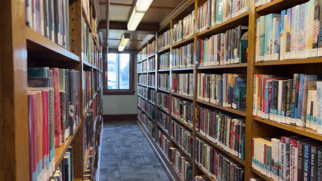 Public Library indoors, bookshelves full of books