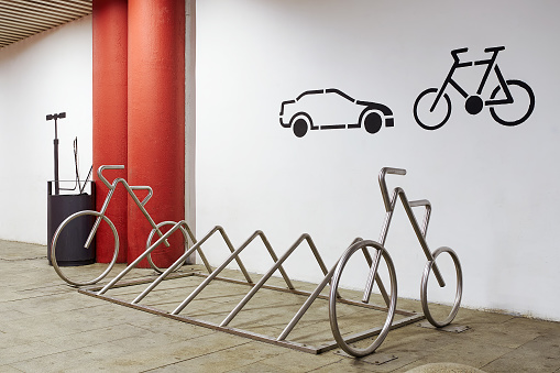 Underground bicycle parking in the shopping center. The concept of a healthy lifestyle.