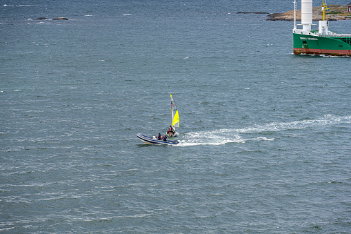 Two maxi yachts meet during ocean regatta