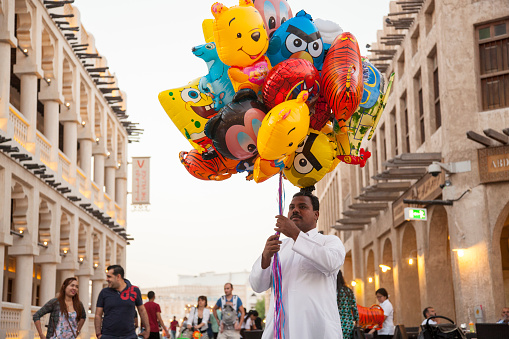 Doha, Qatar - March 05, 2019 :The streets of the traditional Arab market Wakif are crowded with people.