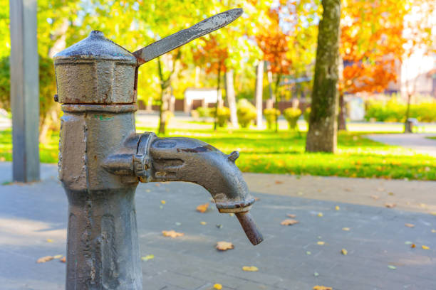 istock Hand pump drinking well at the local park 1439598890