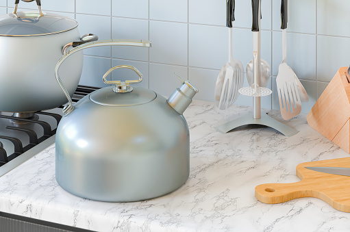 Big metallic kettle with whistle on the kitchen table. 3D rendering