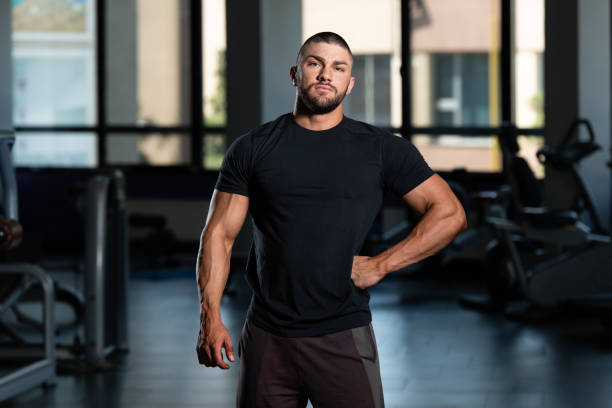 istock Handsome Man Posing In Black T-shirt 1439605414