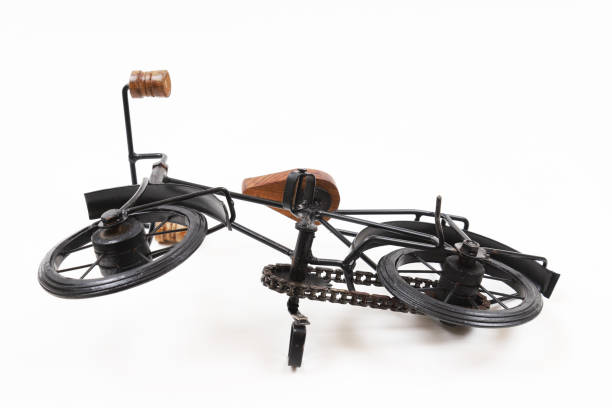 istock Decorative souvenir bicycle on a white background. Shallow depth of field 1439608922