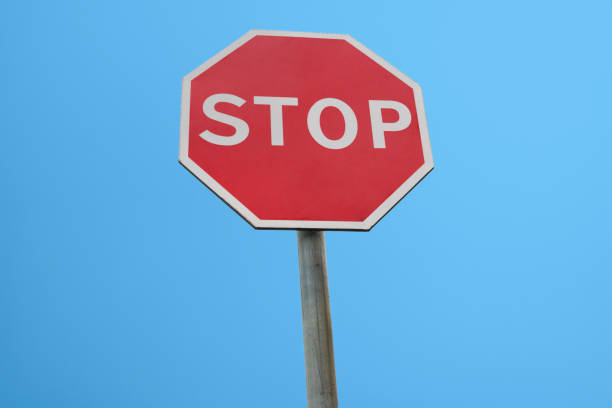 istock A traffic STOP sign and blue sky 1439609413
