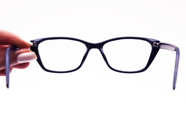 istock Spectacles with diopters in a black frame on a white background. Shallow depth of field 1439610073