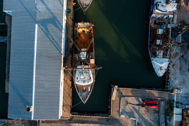 Aerial View top down of a commercial fishing vessel docked in Hampton Virginia Hampton Virginia - April 17 2022: Aerial View top down of a commercial fishing vessel docked in Hampton Virginia hampton virginia stock pictures, royalty-free photos & images